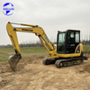 Gebrauchter Komatsu PC56 Bagger